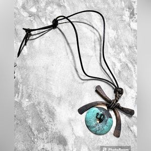 Lg round turquoise stone, ironwork design Chinese design leather cord necklace